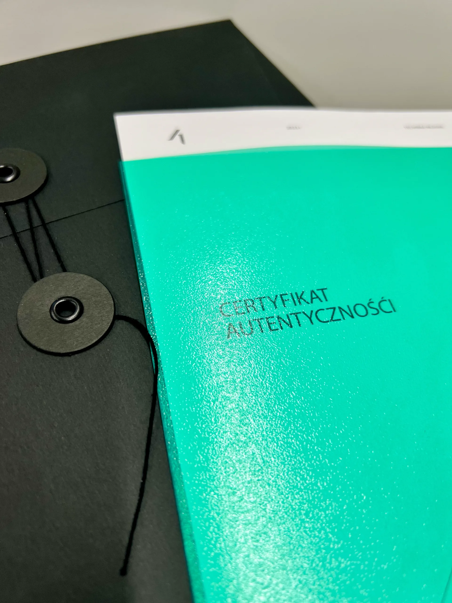 Certificate in its black presentation box